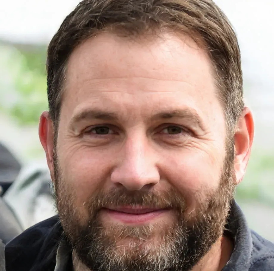 Coin Up: Lightning Smiling bearded man looking at the camera